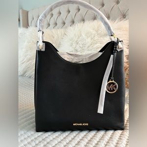 Brand new BLACK Michael Kors handbag.